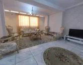مبلمان سلطنتی و تلویزیون سالن نشیمن آپارتمان در عفیف آباد