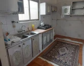 آشپزخانه با کبینت های فلزی و اجاق گاز ویلا در شیراز 415646